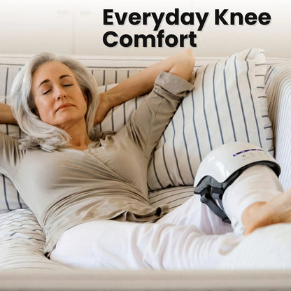 Woman relaxing at home using VO25 heated knee massager for everyday knee comfort