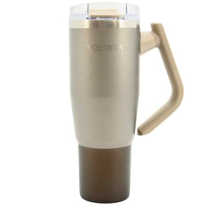 Beige insulated tumbler with handle and straw lid front view
